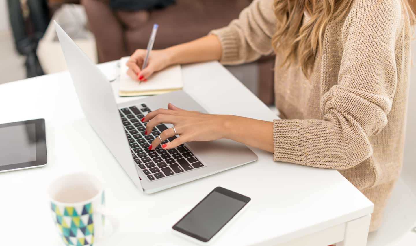 woman freelance writing on a laptop